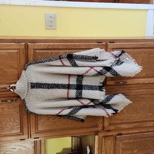 Tan/black/red turtleneck poncho